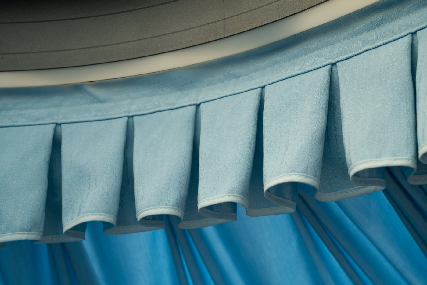 Close-up of a blue fabric detail inside a geodesic dome tent, showcasing the high-quality materials used in luxury glamping solutions. Perfect for those interested in geodesic dome house kits, backyard domes, and stylish camping pods.